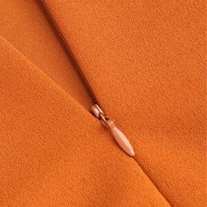 Solid Cut Out Orange Midi Dress.